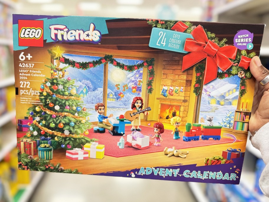 hand holding up LEGO Friends Advent Calendar box in store