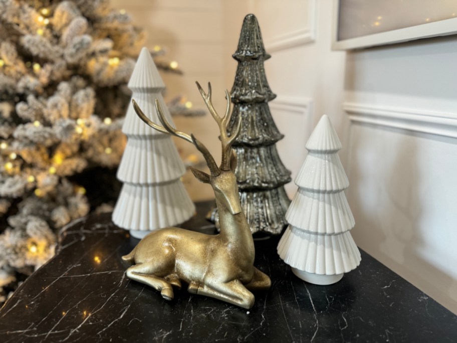 My Texas House tabletop Christmas decorations including trees and deer statues