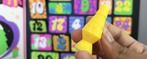 hand holding yellow lava lamp from NeeDoh 24 Days of Christmas Advent Calendar