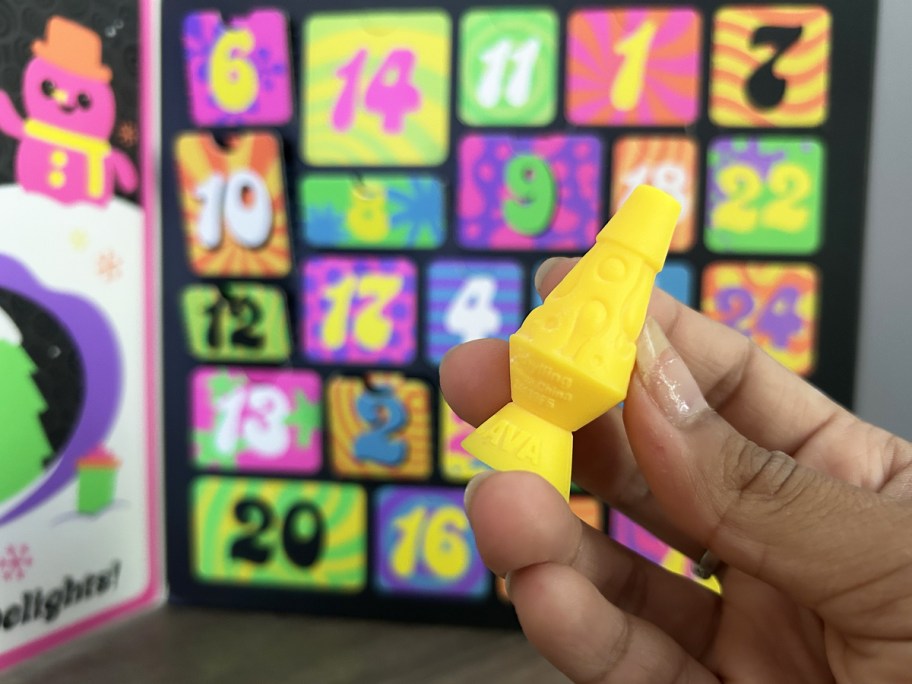 hand holding yellow lava lamp from NeeDoh 24 Days of Christmas Advent Calendar