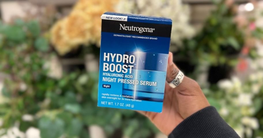 Neutrogena Hydro Boost Night Pressed Serum box in hand in store