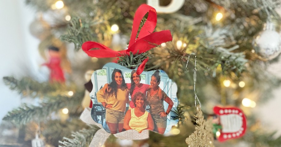 metal photo ornament on christmas tree