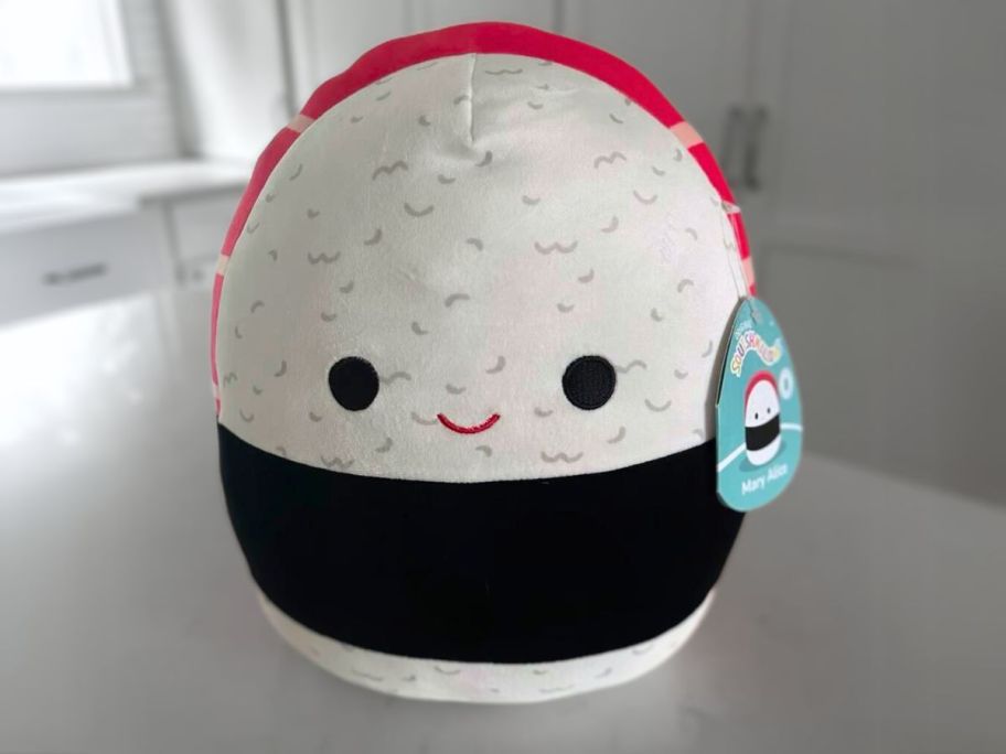 squishmallows tuna sushi plush on a kitchen counter