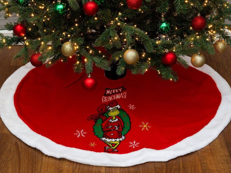 The Grinch Merry Christmas Tree Skirt under tree