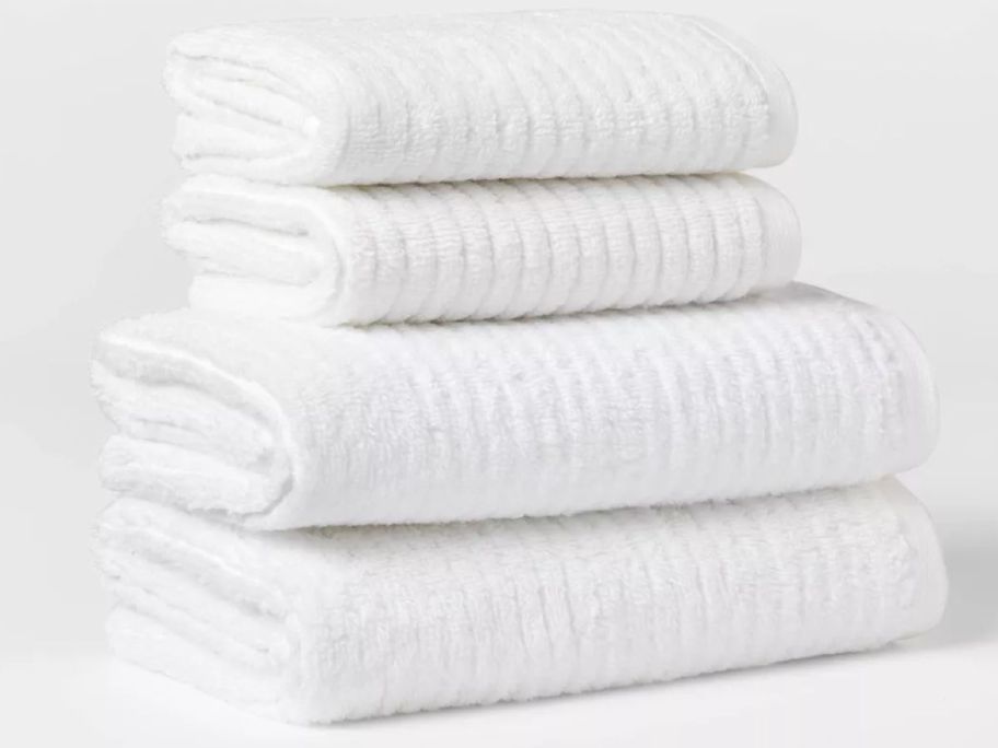 4 white Threshold ribbed towels 