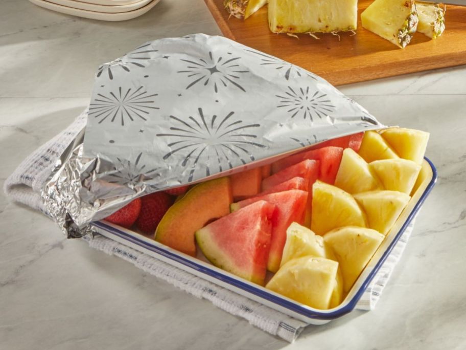 Fruit being covered by a fireworks tin foil