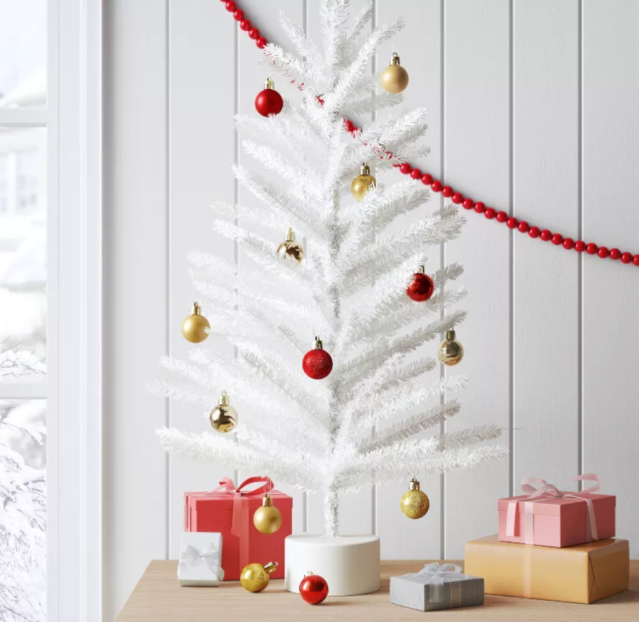 Tinsel Christmas Tree from Target displayed next to other holiday decor