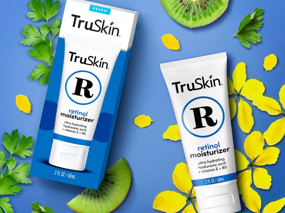 box and tube of TruSkin Retinol Face Moisturizer near flowers