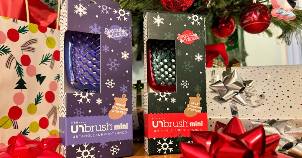 Unbrush Mini Sets next to christmas tree and packages