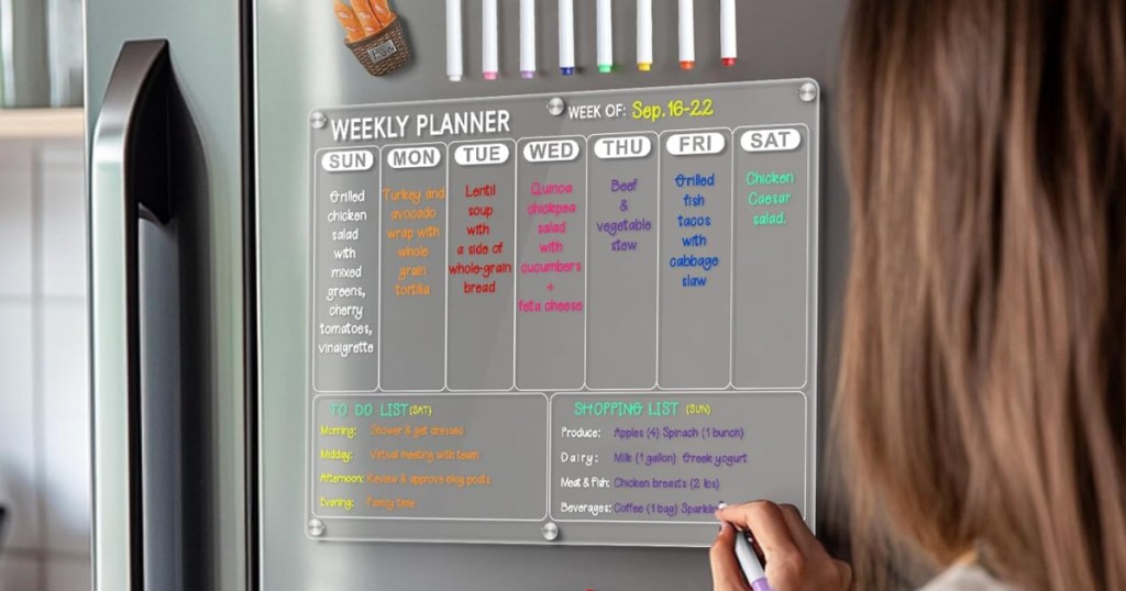 Weekly planner on gray refrigerator