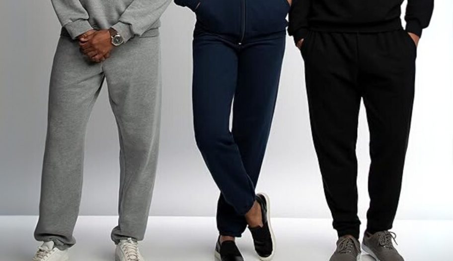 a woman and two men wearing fleece joggers and sweats