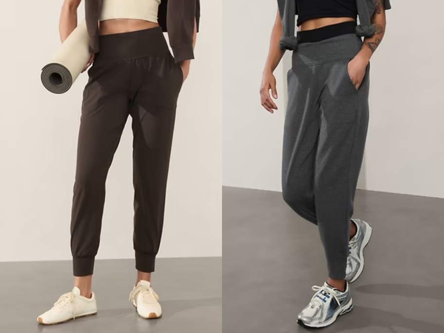 women wearing joggers, one in black, one in dark grey