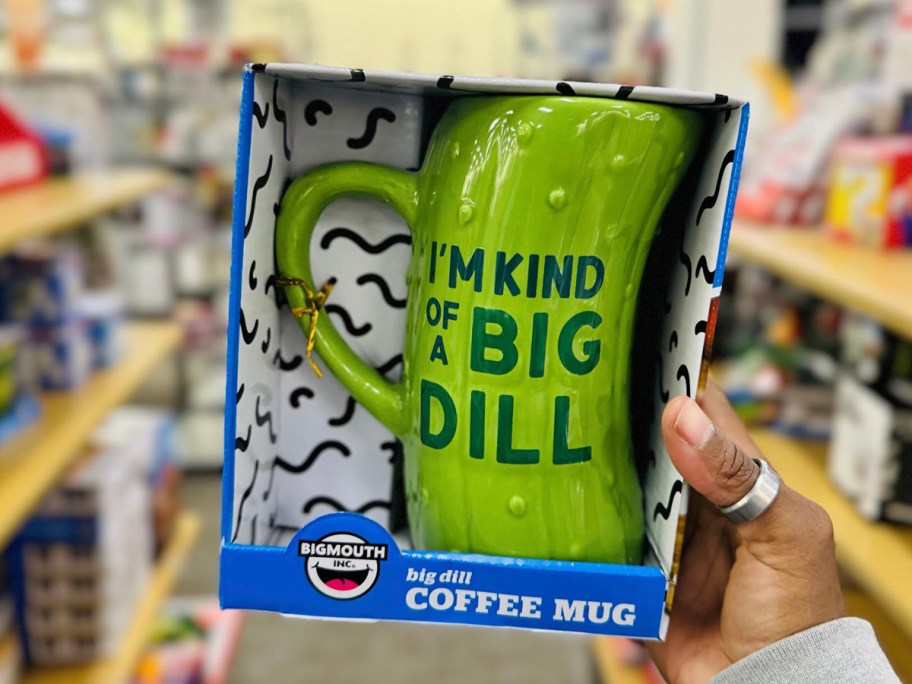 hand holding bigmouth big dill mug 