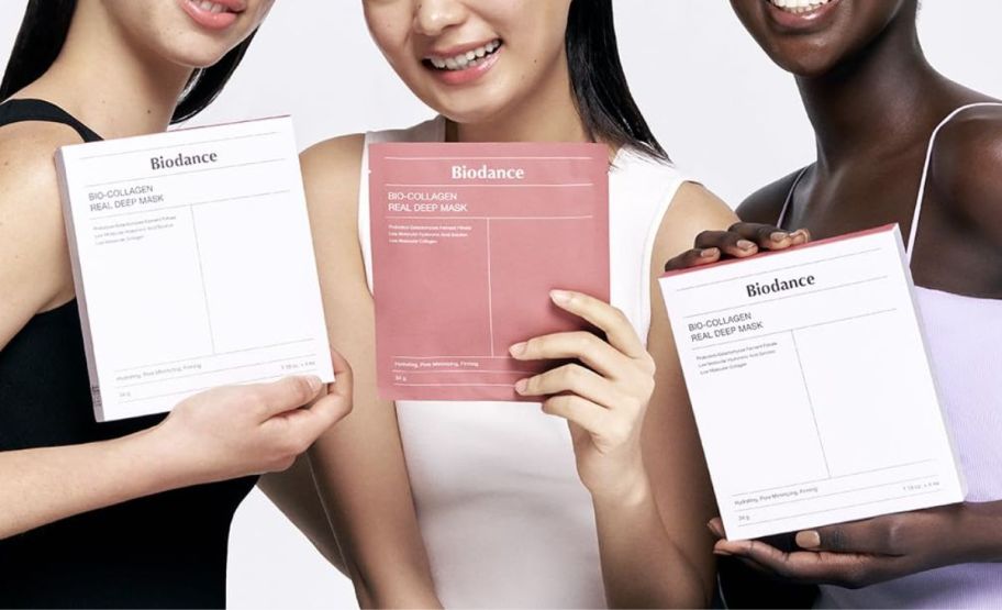 three models holding packages of biodance collagen masks