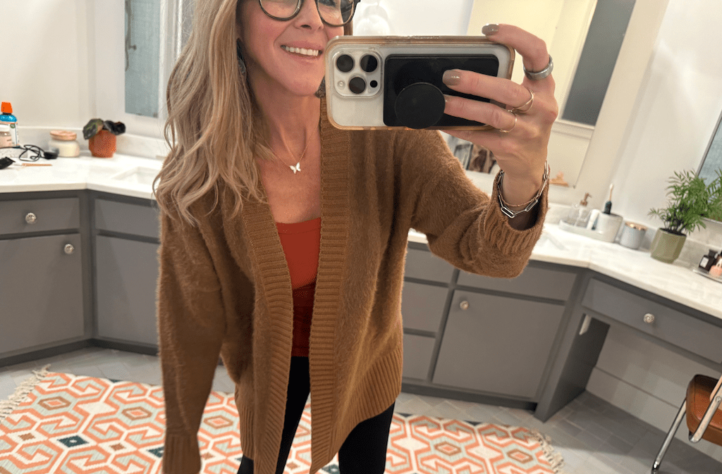 woman wearing brown cardigan 