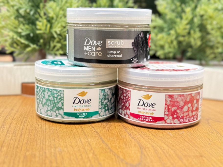 three small jars of dove holiday scents body scrubs