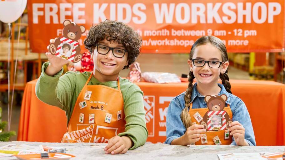 boy and girl at home depot kids workshop counter