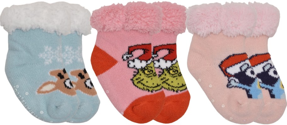 Three pairs of kids Christmas socks.