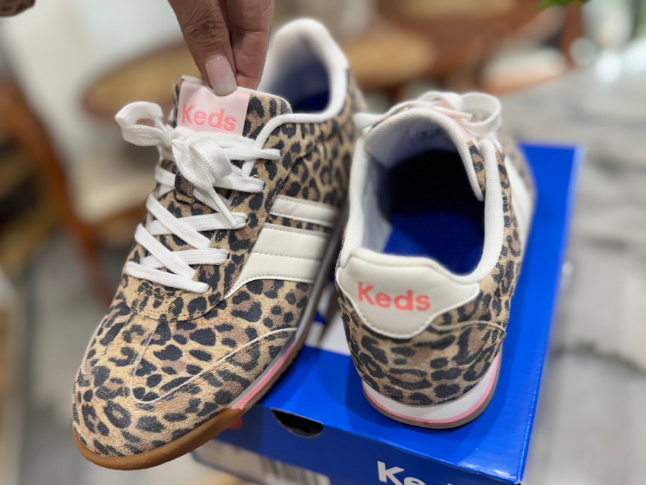 pair of cheetah print keds shoes 