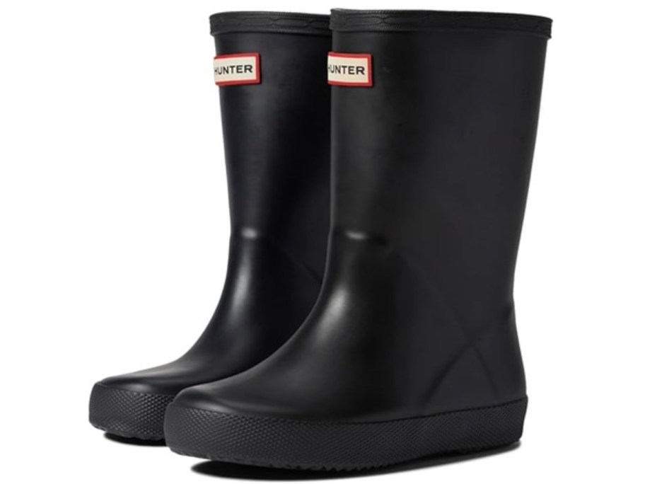 a pair of black kid's tall Hunter rubber boots