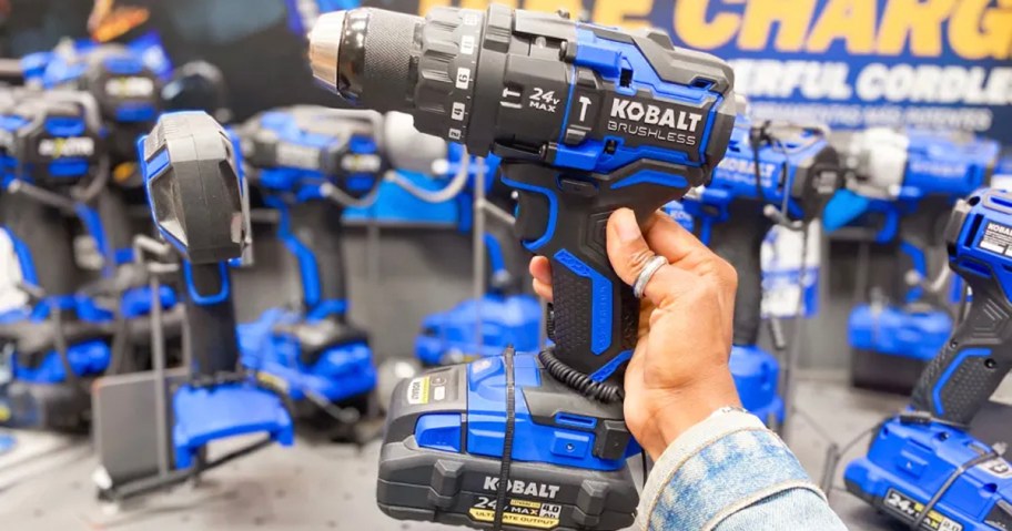 hand holding blue and black kobalt impact driver 