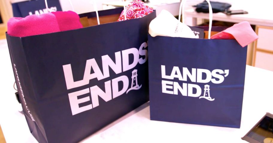 lands end shopping bags on table