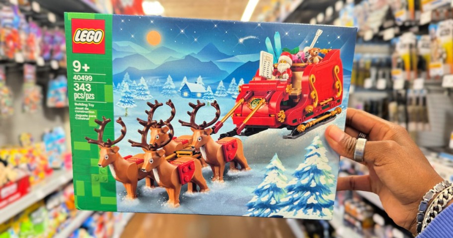 lego santa's sleigh set in hand