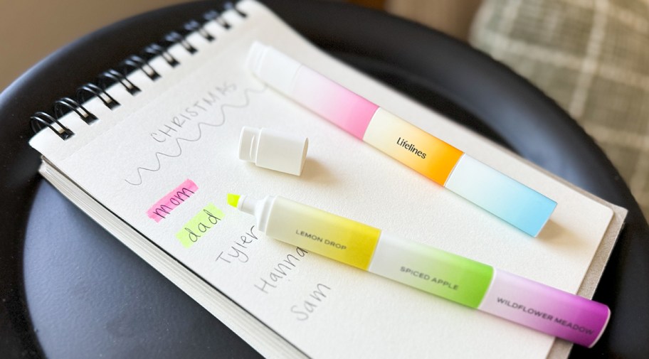 lifeline highlighters on a notebook