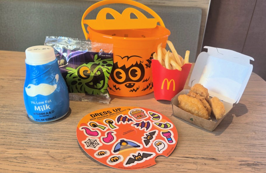 mcdonalds happy meal and boo bucket displayed on a table