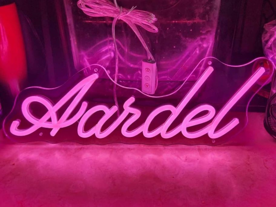 A custom neon sign with the name Aardel