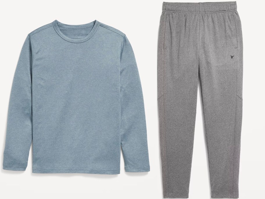 blue long sleeve shirt and gray pants 