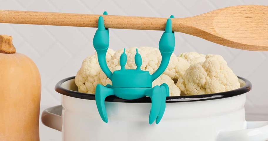 crab spoonholder in pot of cauliflower