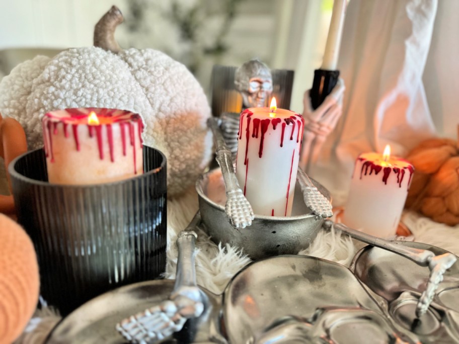 bloody pillar candles on a Halloween table