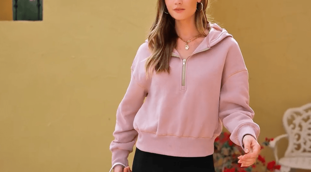 woman wearing pink pullover 