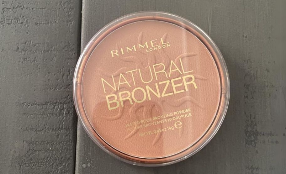 a pan of rimmel london natural matte finish bronzer on a tabletop