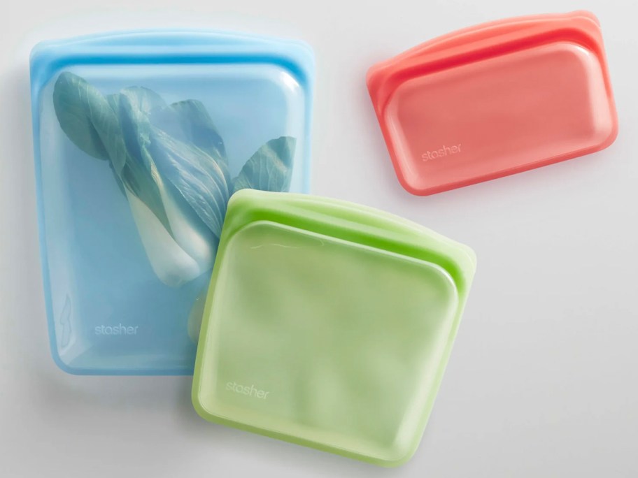 blue, green, and pink stasher bags 