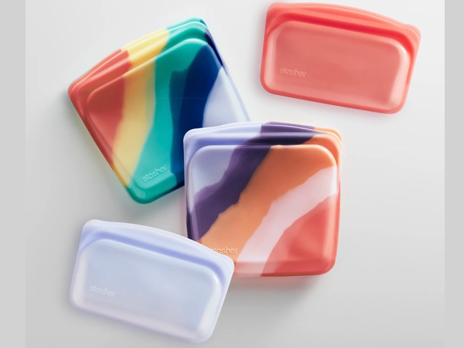 pink, purple, and multicolored lunch bags 