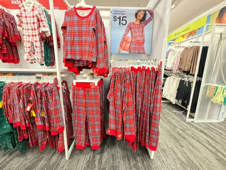 red plaid print pajama tops and pants on a store display in Target