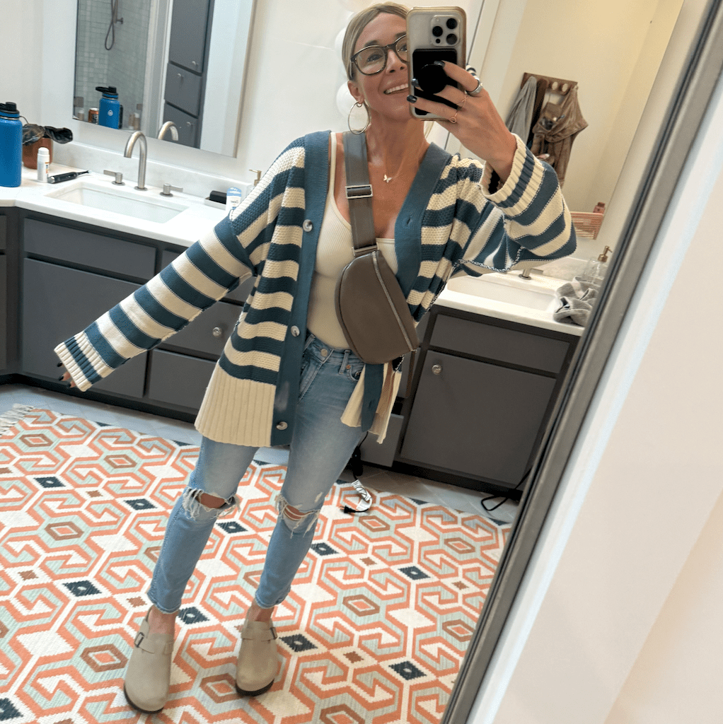 woman wearing striped cardigan