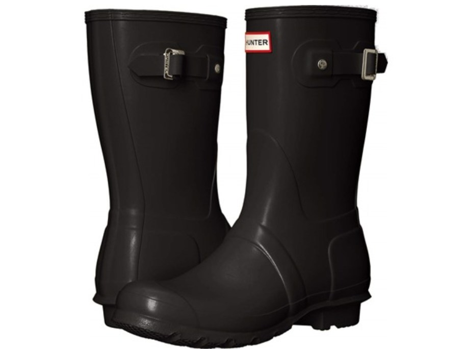 a pair of women's black rubber Hunter boots, mid calf length