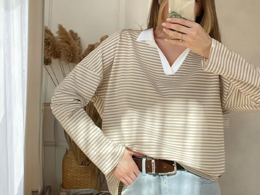 woman wearing tan and white striped shirt 