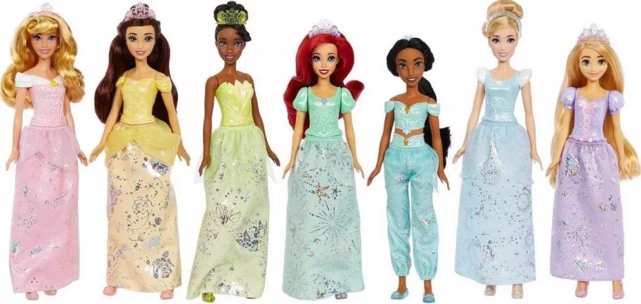 a set of 7 Disney Princess dolls