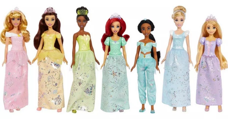 a set of 7 Disney Princess dolls