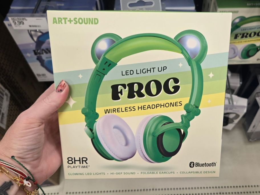 ART+SOUND Frog Kids Headphones in hand in store