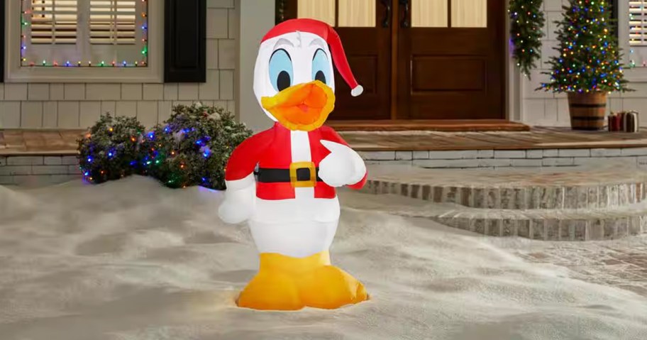 Donald Duck in Santa Outfit inflatable in yard