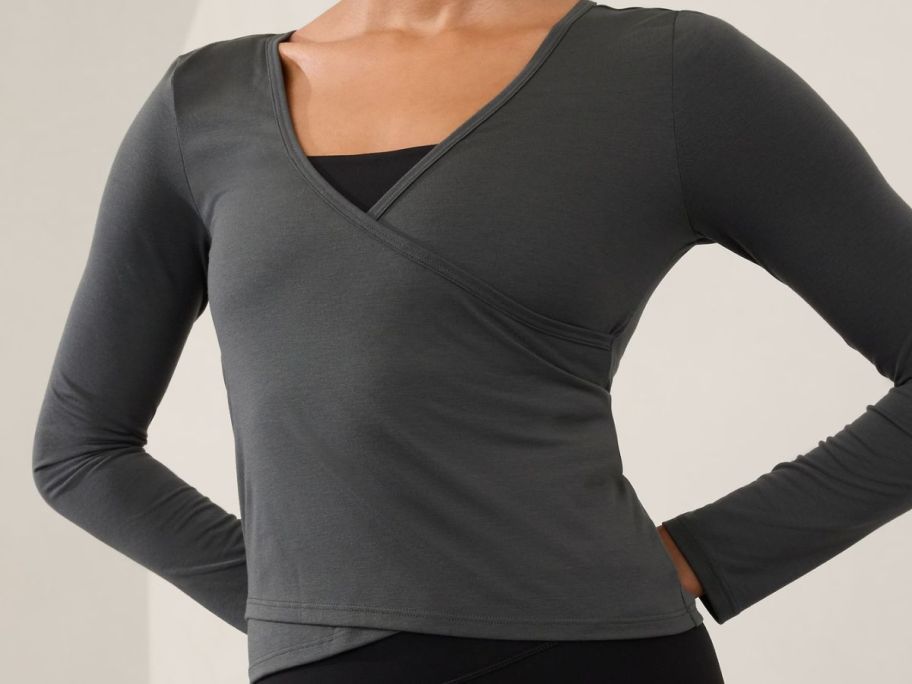 Woman wearing an Athleta Wrap Top