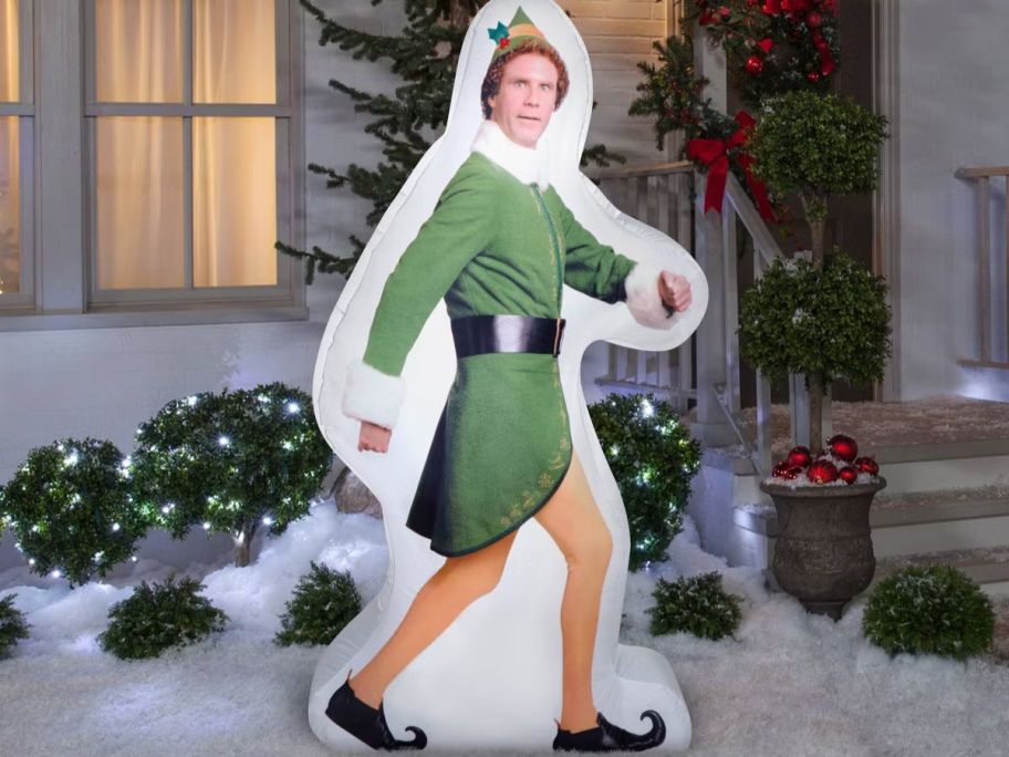 Buddy the Elf 6' Christmas Inflatable in front of a house