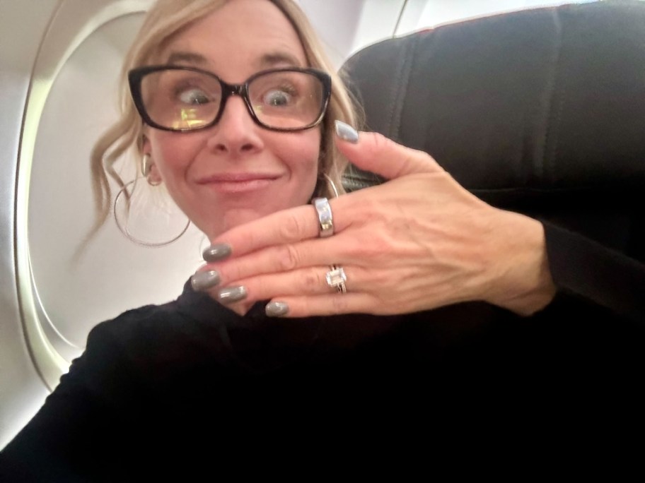 woman staring at oura ring