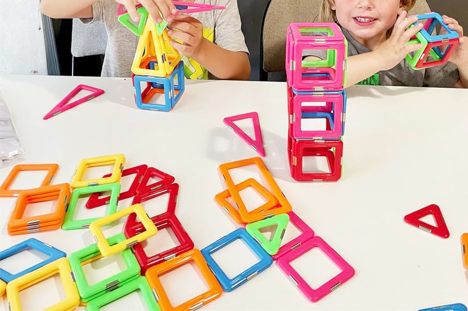 kids playing with magnetic tiles set