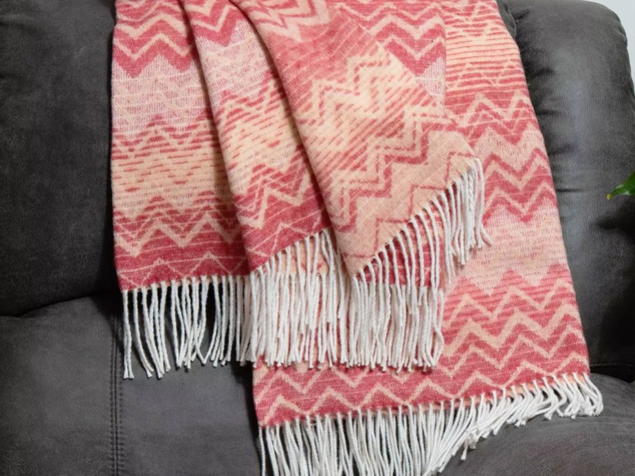 red chevron print throw draped over a couch